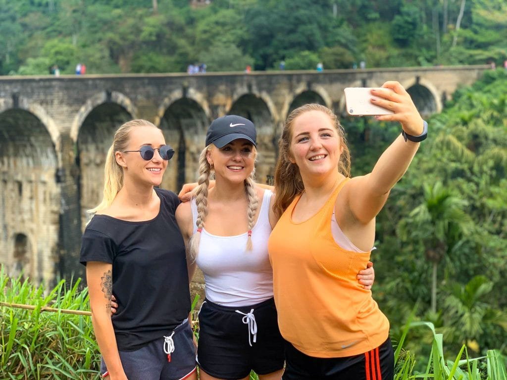 Girls taking selfie at 9 arches bridge