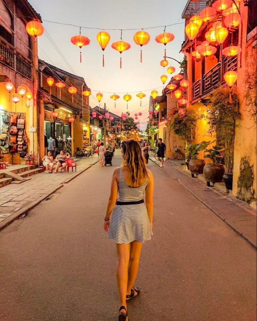 Girl walking through Hoi An Old Town