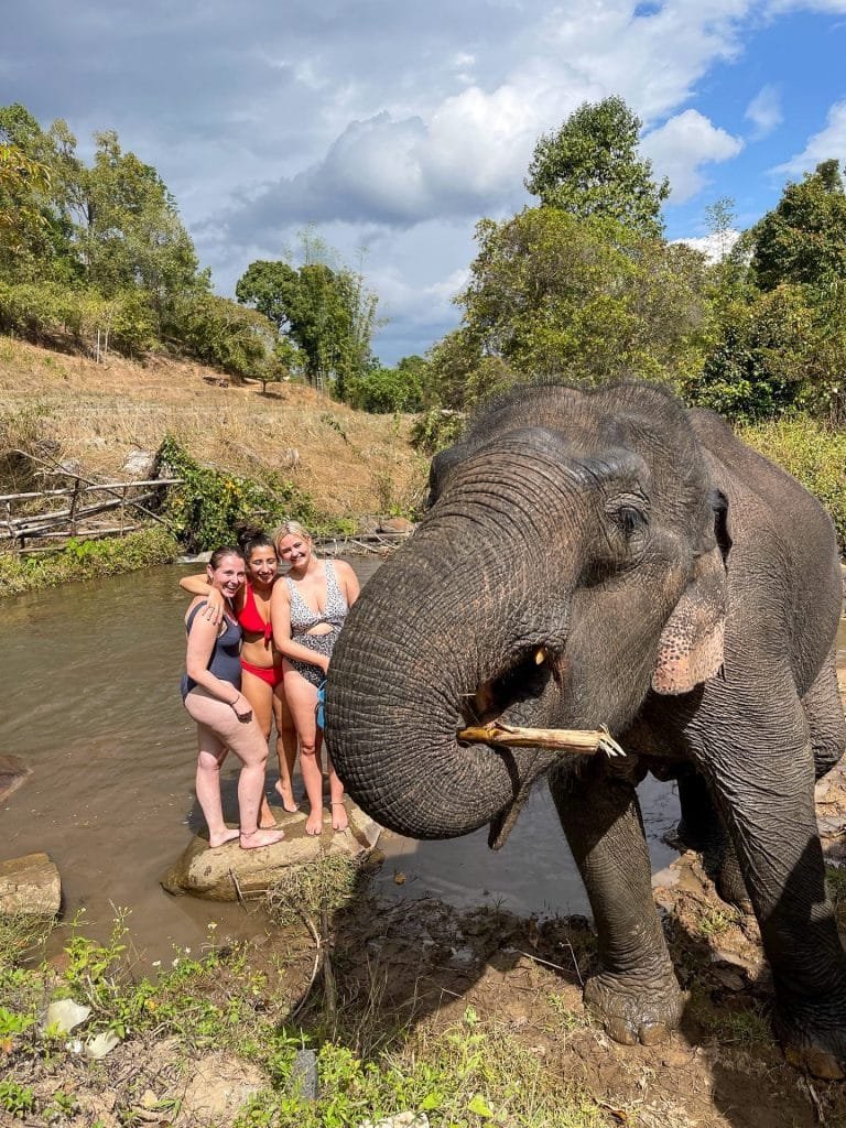 Girls with an elephant in north Thailand