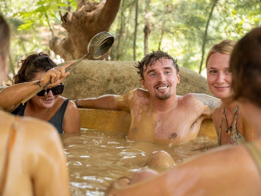 A group enjoying the mud baths in Vietnam