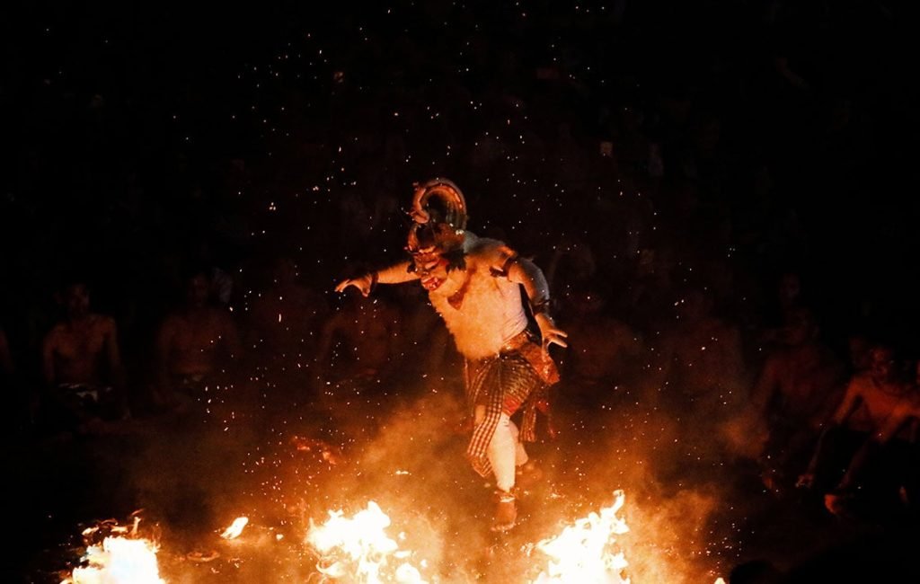 A picture of the Kecak Fire Dance, another reason why Uluwatu is worth visiting. 
