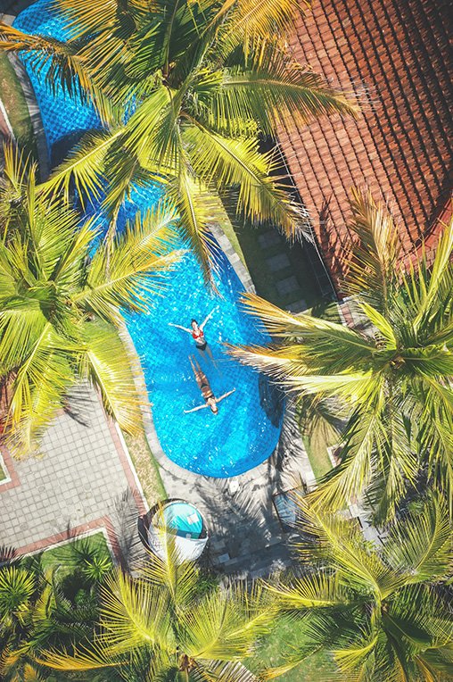 A drone shot of a villa in Bali with a pool. Villas are expensive and if you stay in one, the answer to "Is Bali expensive?" is yes.