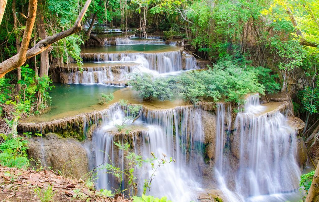 A picture of a stepped waterfall. Is Krabi worth visting? Yes, the natural beauty is amazing.