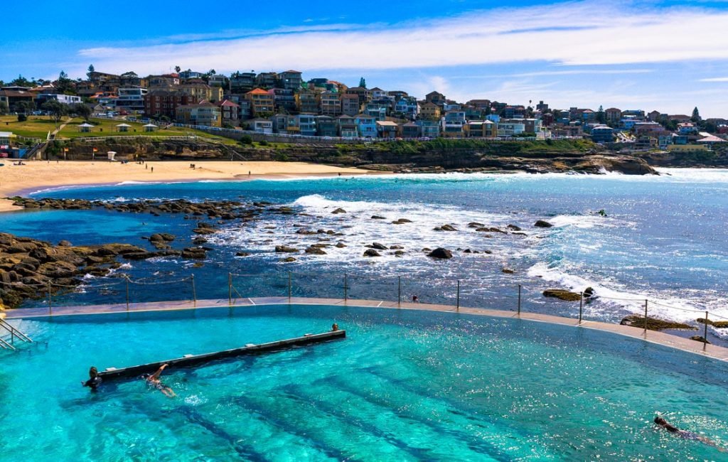 A picture of the pool at Bronte Beach with the beach in the background, it's another of the best beaches in Australia Sydney 