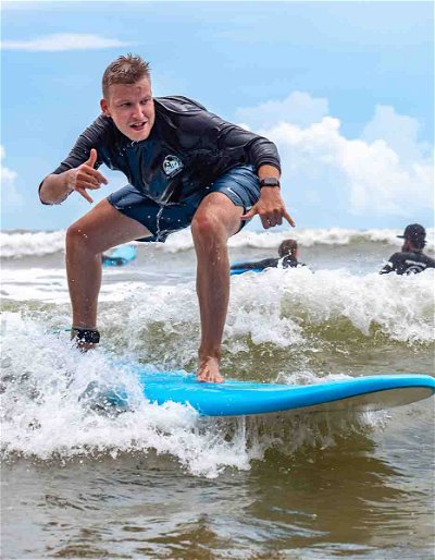 Learn to catch your first wave surfing in Weligama